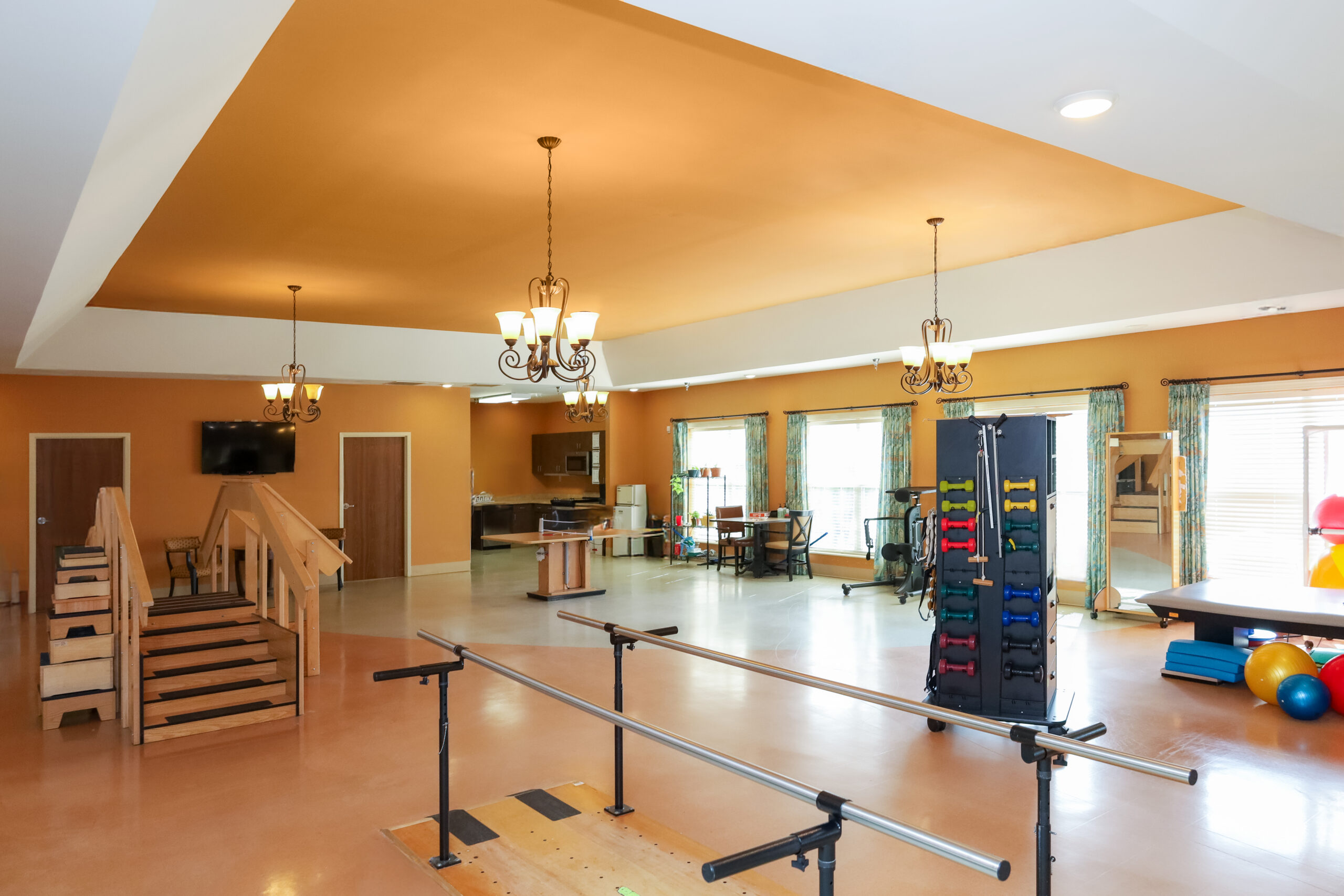 Skilled nurse providing comfort-focused care for a resident living with advanced illness