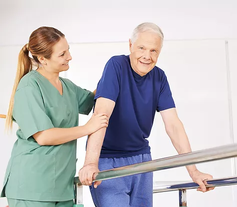 Occupational therapist assisting a resident with daily living skills at Scottish Pines Rehabilitation & Nursing Center